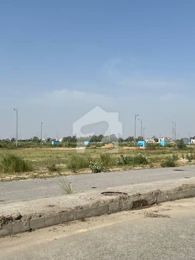 DHA Phase 9 Prism F Block 1 Kanal Plot for Sale in a prime and rapidly developing location. Ideal for constructing a luxury home or making a secure long-term investment.