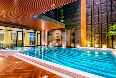 2 KANAL ULTRA LUXURY TOP-NOTCH MODERN BUNGALOW | FULLY FURNISHED | TRIPLE-HEIGHT SWIMMING POOL | 25 KV SOLAR | 70 FT ROAD | DHA PHASE 6 | 100% ORIGINAL DEAL