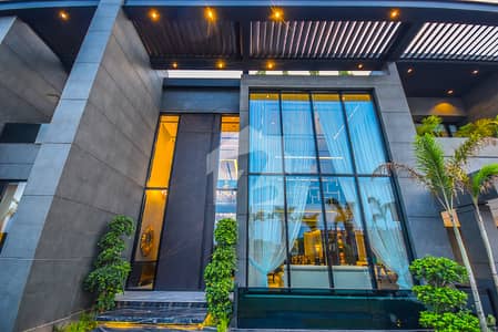 2 Kanal Brand New Mazhar Munir Design Most Beautiful Full Basement Fully Furnished Home Theater Swimming Pool Top Roof Garden Bungalow For Sale At Prime Location Of DHA Lahore Near To Commercial Market
