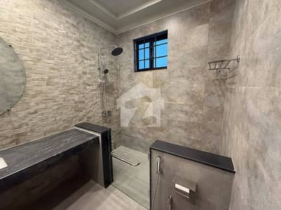 NICE LOOKING ONE KANAL UPPER PORTION AVAIL FOR RENT