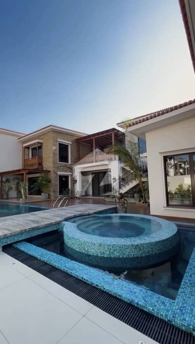 2000 Sq Yard Brand New Bungalow 9 Bedroom With Basement Swimming Pool Home Theatre Lift Install Top Of The Line House Away From Sea Ready To Move