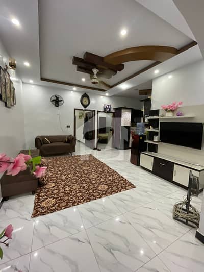 FOR SALE 3 BED PORTION (PENTHOUSE STYLE) Location: Block 12/11 Dividing Road (Main Road, VIP Location) Portion: 3rd Floor With Roof Size: 300 Sq. Yards