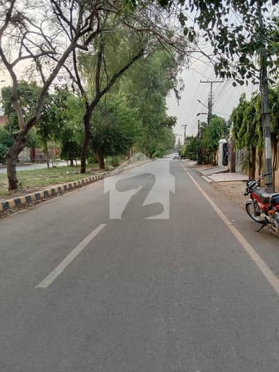 1 kanal building plot rate pr basement +ground floor facing expo center next to corner single owner Best for investment