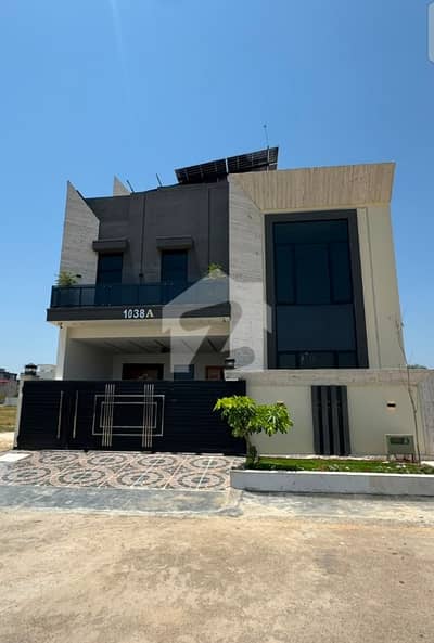 10 Marla Luxury House for Sale - Your Dream Home Awaits!*  Located in a premium gated society with _all modern amenities_, this stunning 10 Marla residence is priced at *Rs:5.85 Cr* - perfect for those who value elegance, comfort & status