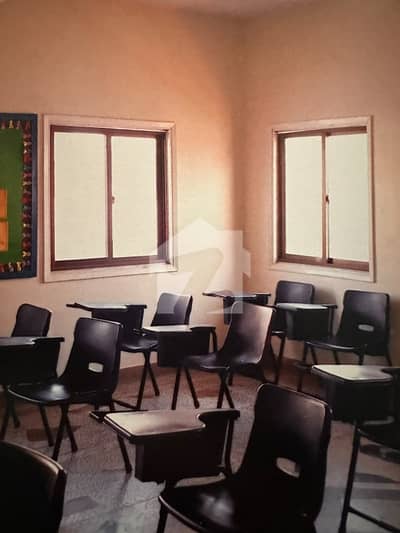 1500 Square Yards Commercial House With 21 Rooms For Rent To School Purpose.  Ideal Location Premium Block 7.