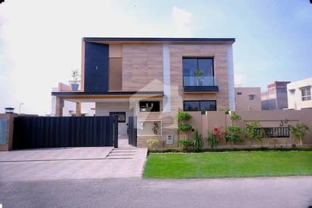 1 KANAL ELEGANT & SUPER HOT LOCATED BUNGALOW WITH BASEMENT IS AVAILABLE IN THE BEST BLOCK OF DHA LAHORE.