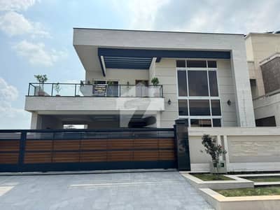 INVESTOR RATE BRAND NEW TRIPLE STOREY HOUSE FOR SALE SECTOR D 12 SIZE ONE KANAL GOOD LOCATION
