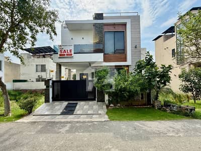 LIGHTLY USED BACK OF MAIN 120-FEET WIDE ROAD AND VERY NEAR TO PARK 5 MARLA ELEGANT AND FULLY MAINTAINED SUPER HOT LOCATED BUNGALOW IS AVAILABLE IN THE C BLOCK OF DHA 9 TOWN LAHORE.