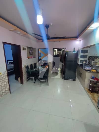 FLAT FOR SALE KARIM SQUARE BLOCK 13D GULSHAN E IQBALENTER CELL 03002175750