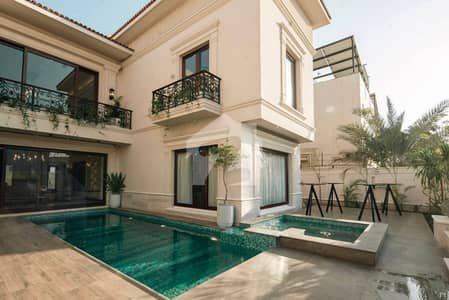 - 1,000 Sq. Yards (90x100) Prime Plot - 2+4 Grand Ensuite Bedrooms - Designer Basement Ideal for Lounge, Studio, or Executive Office - Private Swimming Pool
