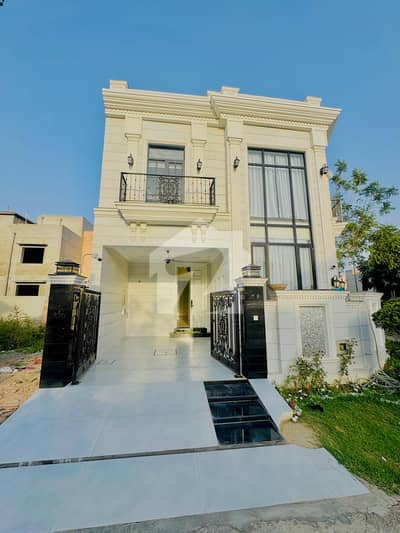 A beautifully designed and impeccably maintained 5 Marla luxury house is available in a prime DHA location, offering the perfect blend of elegance, comfort, and modern living.