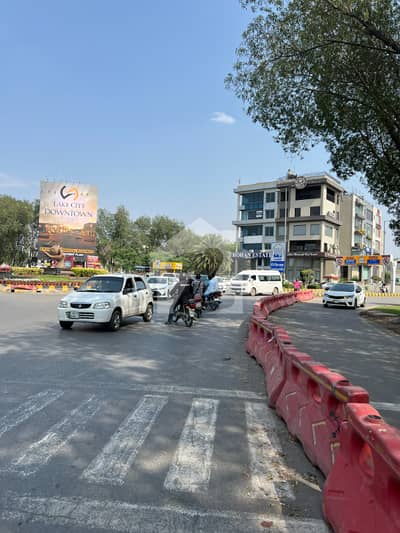 1 Kanal Pair Of Plot G block main 180' wide Road beside Roots School Next To Singal