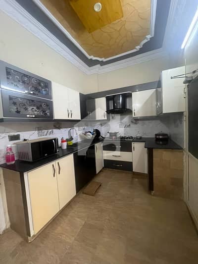 60 Square Yards Ground + 2 House for Rent Ground 2 Bed Lounge + Kitchen 1st & 2nd Floor 2 Bed Lounge West Open Solar Installed | Water Through Tanker | No Load Shedding | Near Main Road | Ideal for Large Families