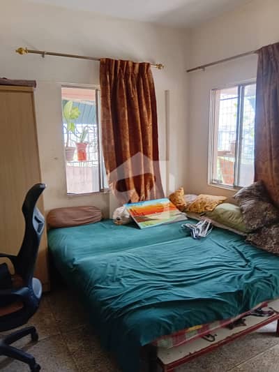 2 Bed Lounge Portion For Rent | Block 12 | Water Boring Available | No Load Shedding | No Gas Issue | Near Main Road | Ideal For Family Living.