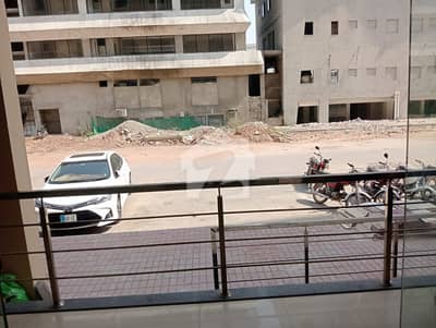 Main ground Floor shop for rent in luxury building bahria town phase 8 business district.