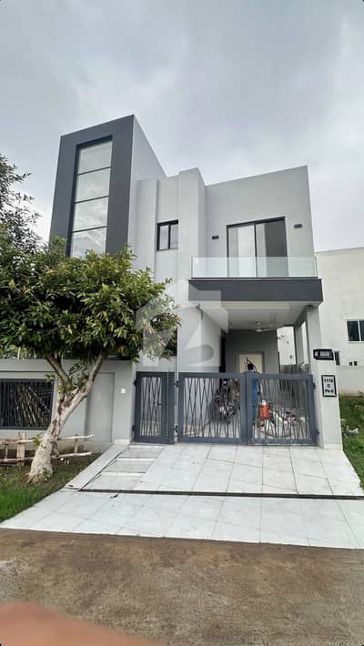 A beautifully designed and impeccably maintained 5 Marla luxury house is available in a prime DHA location, offering the perfect blend of elegance, comfort, and modern living.