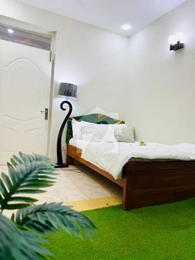 2 BED FURNISHED FLAT FOR RENT 11 CENTRE PLAZA G-11 ISLAMABAD ALL FACILITY AVAILABLE