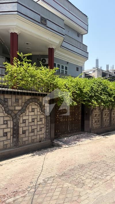 13.5 Marla bnaglow corner . . . 13 Rooms attach bath. . .  2 separate Gates. .  5 cars parking. .   Demand 7cror  Kabotar Chowk Bangash Gated Colony