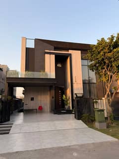 SYED BROTHERS PROUDLY OFFERS: 1-Kanal Elegant And Fully FURNISHED Modern Bungalow Is Available In The Best Block Of DHA Lahore.
