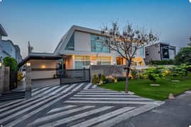 2 KANAL ELEGANT AND FULLY MAINTAINED FURNISHED BUNGALOW WITH BASEMENT & SWIMMING POOL IS AVAILABLE IN THE BEST BLOCK OF DHA LAHORE