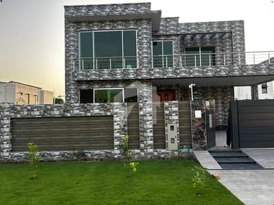 1 KANAL ELEGANT AND FULLY MAINTAINED SUPER HOT LOCATED BUNGALOW IS AVAILABLE IN THE BEST BLOCK OF DHA LAHORE