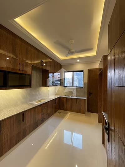 10 Marla Modern Design Beautiful Brand New House Available For Sale  just 1 Mnt Drive From the Main Gate!!