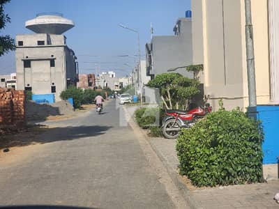 Title: 5.33 Marla Downtown Commercial Plot for Sale | Main Boulevard | Al-Kabir Developers