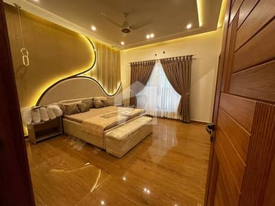 Fully Furnished 10 Marla Designer House Available For Sale  just 1 Mnt Drive From the Main Gate!!