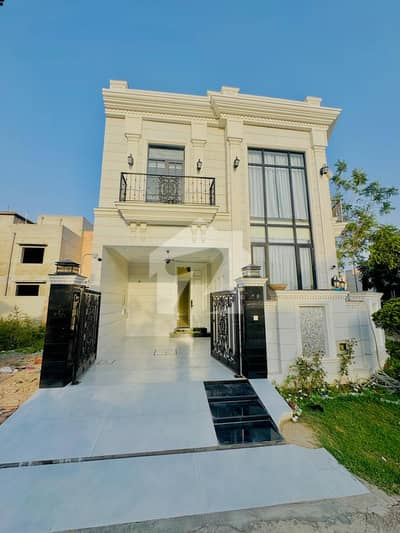 A beautifully designed and impeccably maintained 5 Marla luxury house is available in a prime DHA location, offering the perfect blend of elegance, comfort, and modern living.