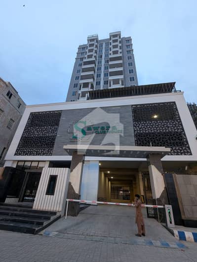 Luxury Brand New Apartment for Rent | Prime Location  Discover modern luxury in this brand new 2,300 Sq. Ft. apartment located in the prestigious Sawera Club, right beside Karachi Club. Designed for those who appreciate comfort, elegance,