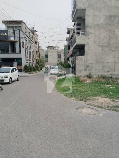 5 Marla Clear Corner & Facing Park Plot For Sale In Eden Boulevard Society College Road Lahore