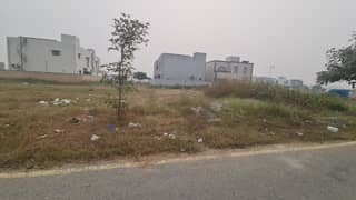 CORNER OR FACING PARK PLOT FOR SALE. IN LOCATED DHA PHASE 8 BLOCK W PLOT NO 687