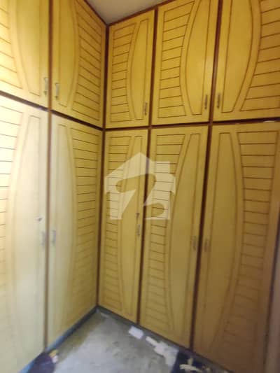 Upper Portion Of One Kanal With Three Bedrooms Attach Washroom And Parking Garage Available In Model Town Link Road