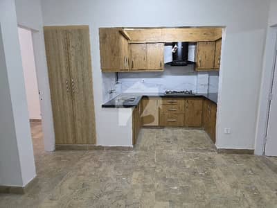 DEFENCE 2 BEDROOMS FIRST FLOOR TAHUEED COMMERCIAL