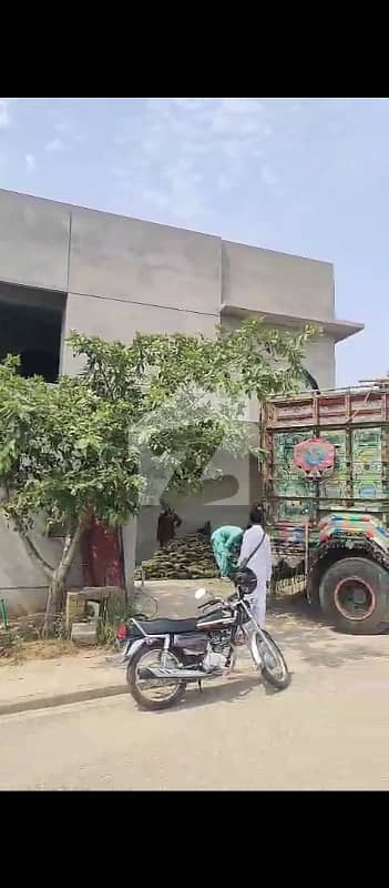 2 Kanal Premium Property With Luxurious Grey Structure And Beautiful Lawn In DHA Phase 5