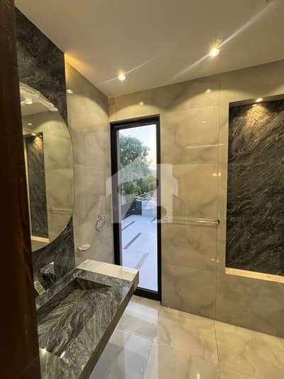 10 Marla House Is Available For Sale Just 1 Mnt Drive From The Main Gate!!