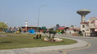 10 Marla Possession Plot For Sale In Tauheed Block Sector E Bahria Town Lahore | Park Facing | Possession, Utility & Park Charges Paid.