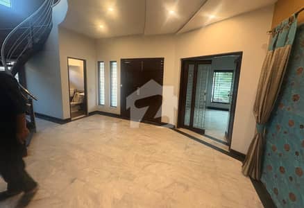 1 Kanal Slightly Used Modern Design House For Rent In DHA Phase 4 Lahore.