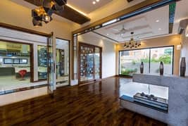 1 KANAL ELEGANT AND FULLY MAINTAINED SUPER HOT LOCATED BUNGALOW IS AVAILABLE IN THE BEST BLOCK OF DHA LAHORE