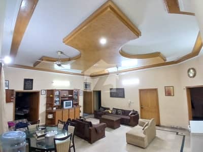 10 marla house with 6 rental shops for sale in Shadbagh Tajpura