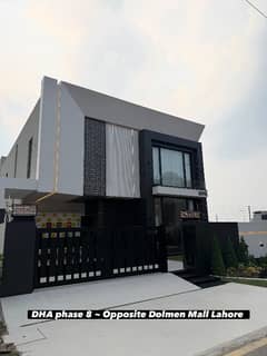 1 Kanal Brand New Ultra-Modern Luxury House For Sale In DHA Phase 8 - Prime Location Opposite Dolmen Mall