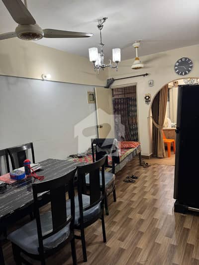 Prime 2 Bed Drawing & Dining First Floor Corner Flat for Sale in Hunaid City, Block 17, Gulistan-e-Johar Boundary Wall Project with Car Parking, Secure Environment & Load Shedding Free Area.
