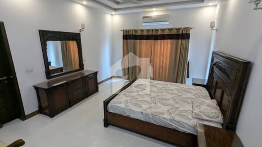 1 Kanal Fully Furnished 5 Bedrooms House With 3 Servant Quarters Full Basement FOR RENT In Phase 4 DHA Lahore