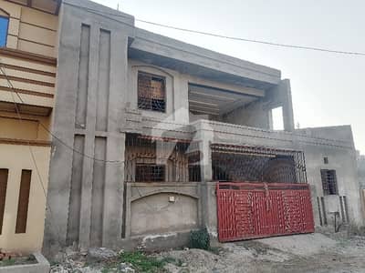 1.5 Story Gray Structure Triangle Shape Like Samosa Near Nala