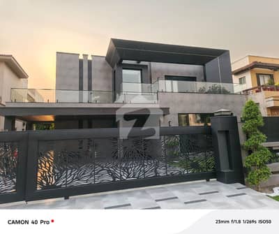 Own a Prestigious Address in DHA Phase 5 Exquisite 1-Kanal Brand New Modern Residence Offering Smart Space Planning, 5 Luxury Bedrooms, Drawing Dining, 2 TV Lounges, 2 Kitchens & Prime Location | Demand Rs. 15 Crore 35 Lac (Negotiable) Own a Prestigious Address in DHA Phase 5 Exquisite 1-Kanal Brand New Modern Residence Offering Smart Space Planning, 5 Luxury Bedrooms, Drawing Dining, 2 TV Lounges, 2 Kitchens & Prime Location | Demand Rs. 15 Crore 35 Lac (Negotiable)