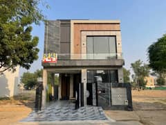 5 Marla Brand New Super luxury ultra Modern Designer top location House For sale in DHA Rahbar