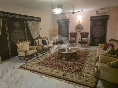 DHA PHASE 1 1000 YARDS 5 BEDROOMS TILE FLOORING WEST OPEN RENOVATED BUNGALOW IS UP FOR SALE ON MOST PRIME LOCATION NEAR DHA OFFICE