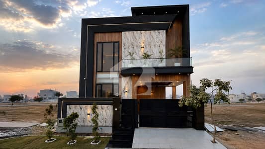 Exquisite luxury mansion featuring a 07KW solar system, ideally positioned on a wide boulevard in prestigious DHA 9 Town, offering elegance, comfort, energy efficiency, and exceptional value.