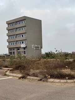 Prime 100 Yards Peninsula Commercial Plot | Direct Access to Khy-e-Faisal, Wide Road Frontage & Adjacent Parking