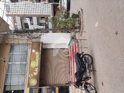 Corner shop road facing centrum shopping mall bank Alhabib wali gali